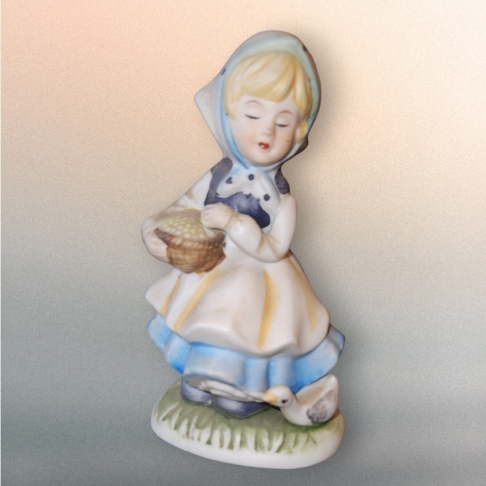 vintage girl with a goose biscuit Figurine statue